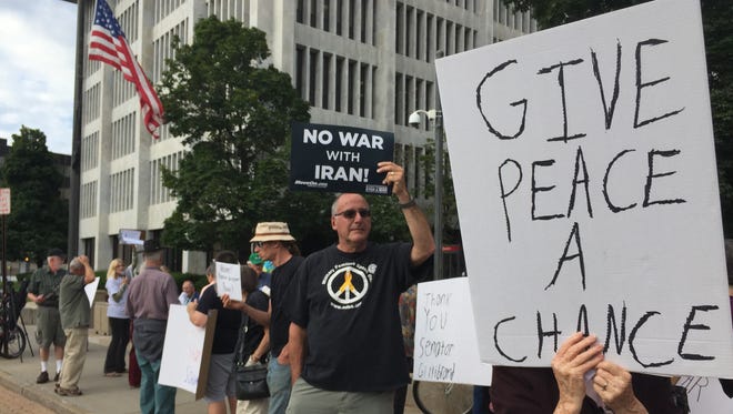 Activists rallied downtown Wednesday in favor of a nuclear deal with Iran.