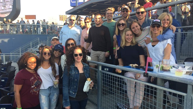 Vaco employees attend a Nashville Sounds game.