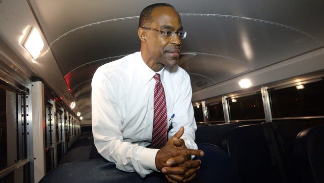 This Aug. 24, 2015 photo shows Broward School Board Superintendent Robert Runcie inside a bus in Pembroke Pines, Fla. The Florida Legislature recently changed state law to allow any resident to challenge their school district's textbooks and curricula and get a hearing before an outside mediator. Runcie, who is also the president of the state superintendents association, said the changes are "cumbersome." Districts have always encouraged parents and residents to voice concerns about materials and curricula, he said, and the mediator is an unnecessary step.