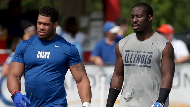 Indianapolis Colts defensive players LaRon Landry, left, and Vontae Davis leave practice after participating for the first time during training camp, on Saturday, August 2, 2014, in Anderson.