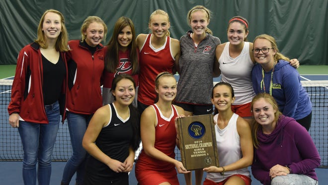 The Pulaski girls tennis team with its WIAA Division 1 sectional title trophy at Western Racquet & Fitness Club on Oct. 6. Front row, from left: Erika Drake, Katie Challoner, Molly Plummer, Brittany Schmidt. Back row: Megan Walkenhorst, Jenna Strenski, Jaclyn Willems, Brooke Steeno, Sofia Magnuson, Lauren Monette, Molly Waggoner. Not pictured: Taylor Bogacz.