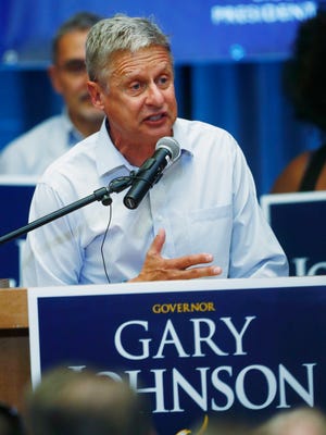 The argument to move to a multi-party political system in the United States is getting stronger, a writer says. Libertarian presidential candidate Gary Johnson speaks during a rally recently in Parker, Colorado.