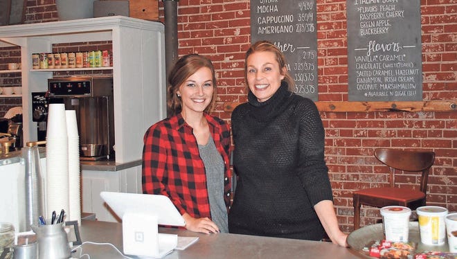 Missy Jones, left, and Jan Kittelson, both Williamsburg, are co-owners of Brickhouse Coffee Company, located on the Williamsburg square at 512 Elm Street.