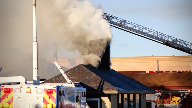 The Alamogordo Fire Department worked Saturday morning to put out the fire inside Emmanuel's Grill, 777 E. First St.
