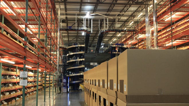 Items are stacked at one of omnichannel commerce technology company Radial's fulfillment centers.