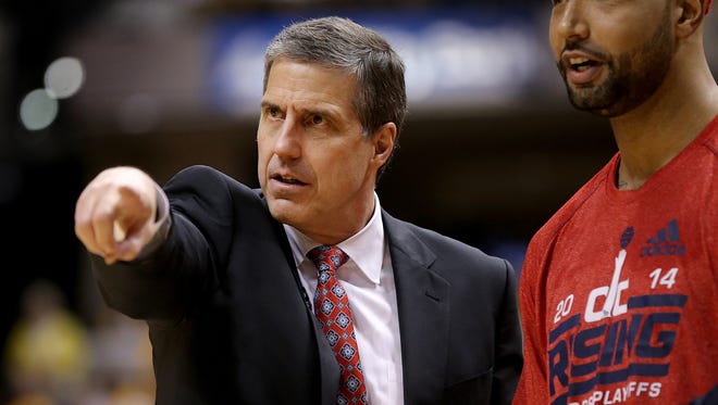 Washington Wizards head coach Randy Wittman looks on during the second half of action. Indiana Pacers play the Washington Wizards in game 1 of the Eastern Conference Semifinals Monday, May 5, 2014, at Bankers Life Fieldhouse. The Wizards defeated the Pacers 102-96.