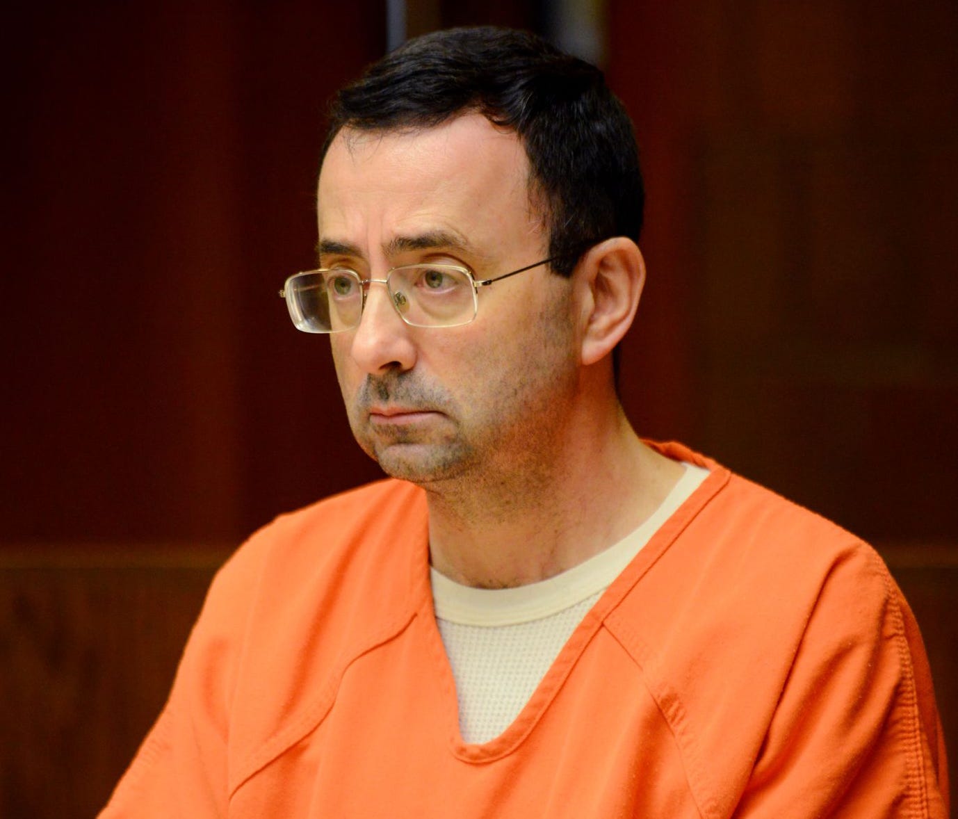 Larry Nassar, the former USA Gymnastics and Michigan State University doctor, listens during the second portion of his preliminary hearing on sexual assault charges Friday, May 26, 2017, at the 55th District Court in Mason, Mich.