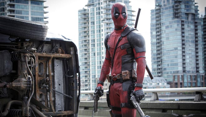 This image released by Twentieth Century Fox shows Ryan Reyonlds in a scene from the film, "Deadpool."