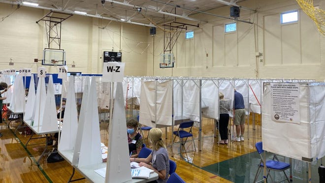 Voters at the polls in Talbot Gym in Exeter Tuesday, Sept. 8, 2020.