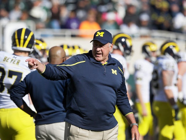 635588407331545034-AP-Michigan-Michigan-St-Foot.JPG