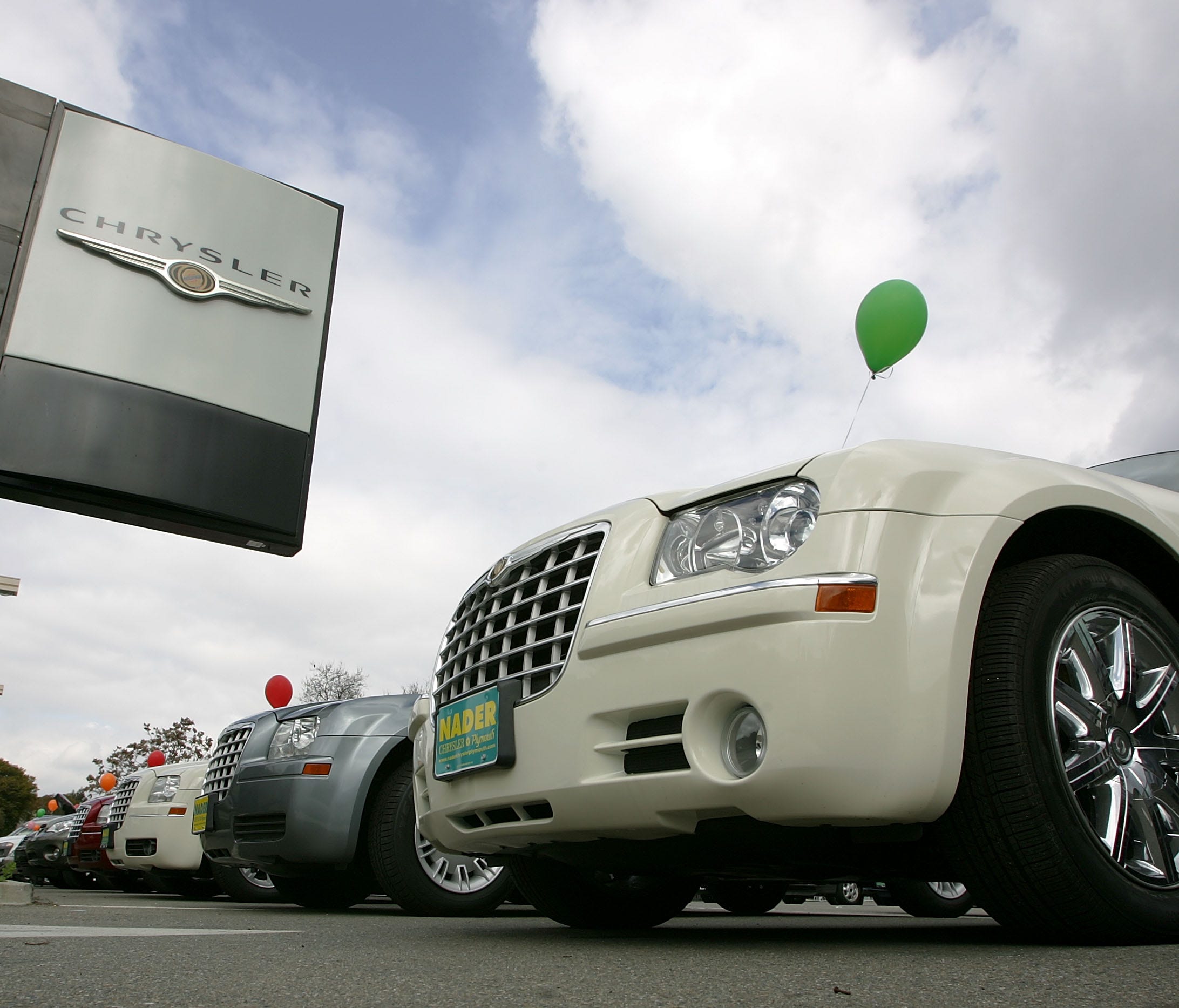 Cars are a tougher sell with gas prices low. Here's a Chrysler dealer in Martinez, Calif.