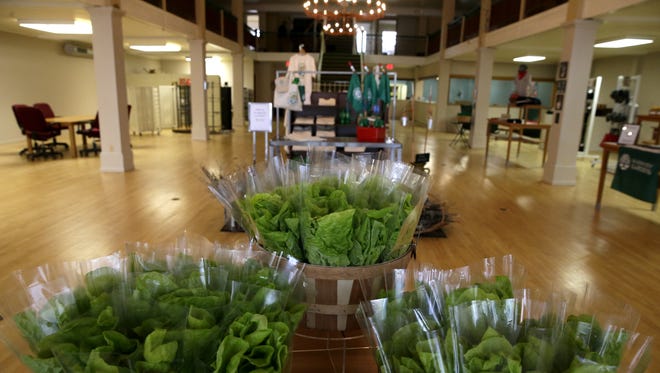 Lettuce from Riverview Gardens is sold on the first floor of their building at 513 W. College Ave. in downtown Appleton.