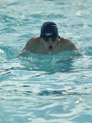 Nathan Harris, 14, swims the butterfly during a practice with the Stuarts Draft Dolphins swim team on Monday, July 20. The Dolphins will go to JMU on Tuesday to compete in their final swim meet of the season