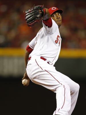 Cincinnati Reds relief pitcher Aroldis Chapman (54) pitches in the ninth inning earning a save against the Arizona Diamondbacks at Great American Ball Park.