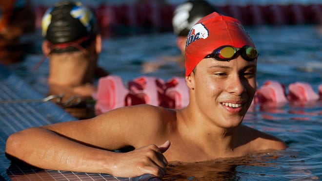 Santi Corredor credits Mac Kennedy for helping him win a 500-yard freestyle state title this season.