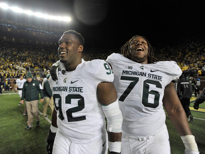 Michigan State defensive lineman Joel Heath (left)