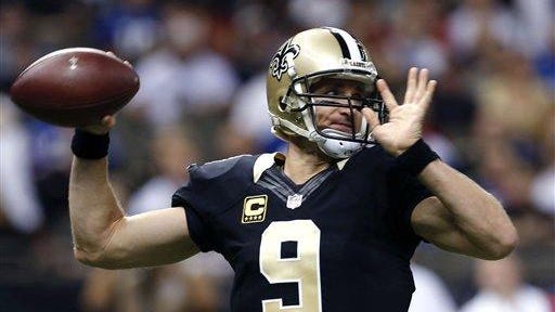 New Orleans Saints quarterback Drew Brees (9) passes against the New York Giants on Sunday.