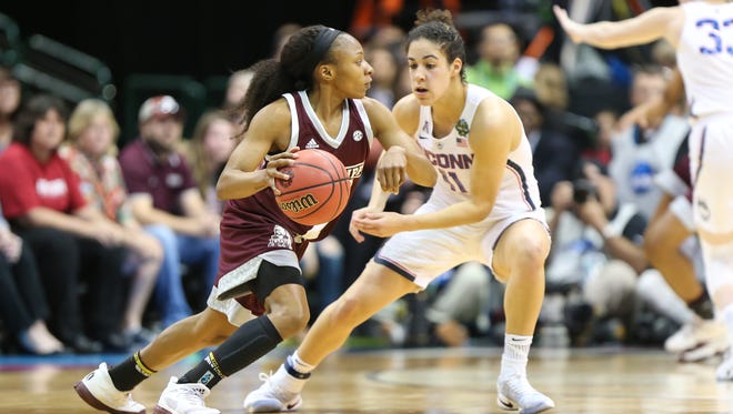 Mississippi State's Morgan William (2) drives on UConn's Kia Nurse (11). Mississippi State played UConn in the semifinal game of the NCAA Women's Final Four in Dallas on Friday, March 31, 2017. Photo by Keith Warren(Mandatory photo credit)