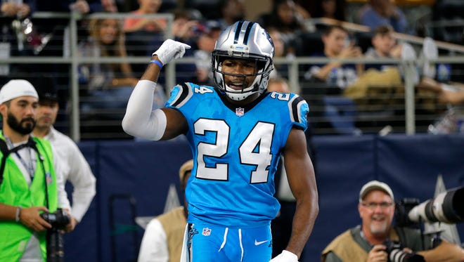 FILE - In this Thursday, Nov. 26, 2015 file photo, Carolina Panthers' Josh Norman gestures in the end zone after breaking up a pass intended for Dallas Cowboys' Dez Bryant during the second half of an NFL football game in Arlington, Texas. Josh Norman, one of the NFL’s top cornerbacks, is now an unrestricted free agent after the Carolina Panthers surprisingly rescinded their non-exclusive franchise tag offer to the All-Pro, Wednesday, April 20, 2016.