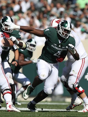 Michigan State Spartans defensive lineman Malik McDowell rushes against the Wisconsin Badgers in the first half Saturday, Sept. 24, 2016 at Spartan Stadium in East Lansing.
