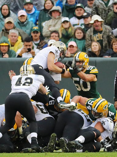 New Orleans Saints quarterback Drew Brees (9) dives