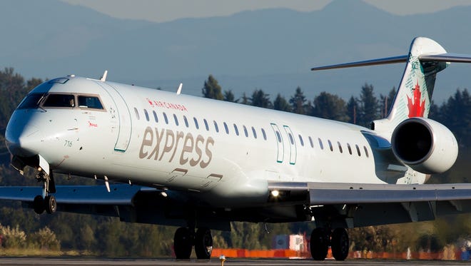 An Air Canada Express Bombardier CRJ-700 regional jet is seen in Seattle in this file photo from Sept. 27, 2015.