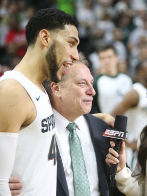 Michigan State's Denzel Valentine and coach Tom Izzo talk with ESPN after the win over Ohio State on Saturday at Breslin Center.