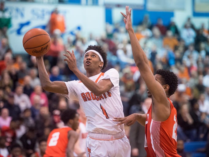 Northeastern's Brandon Coleman (1) shoots a layup against