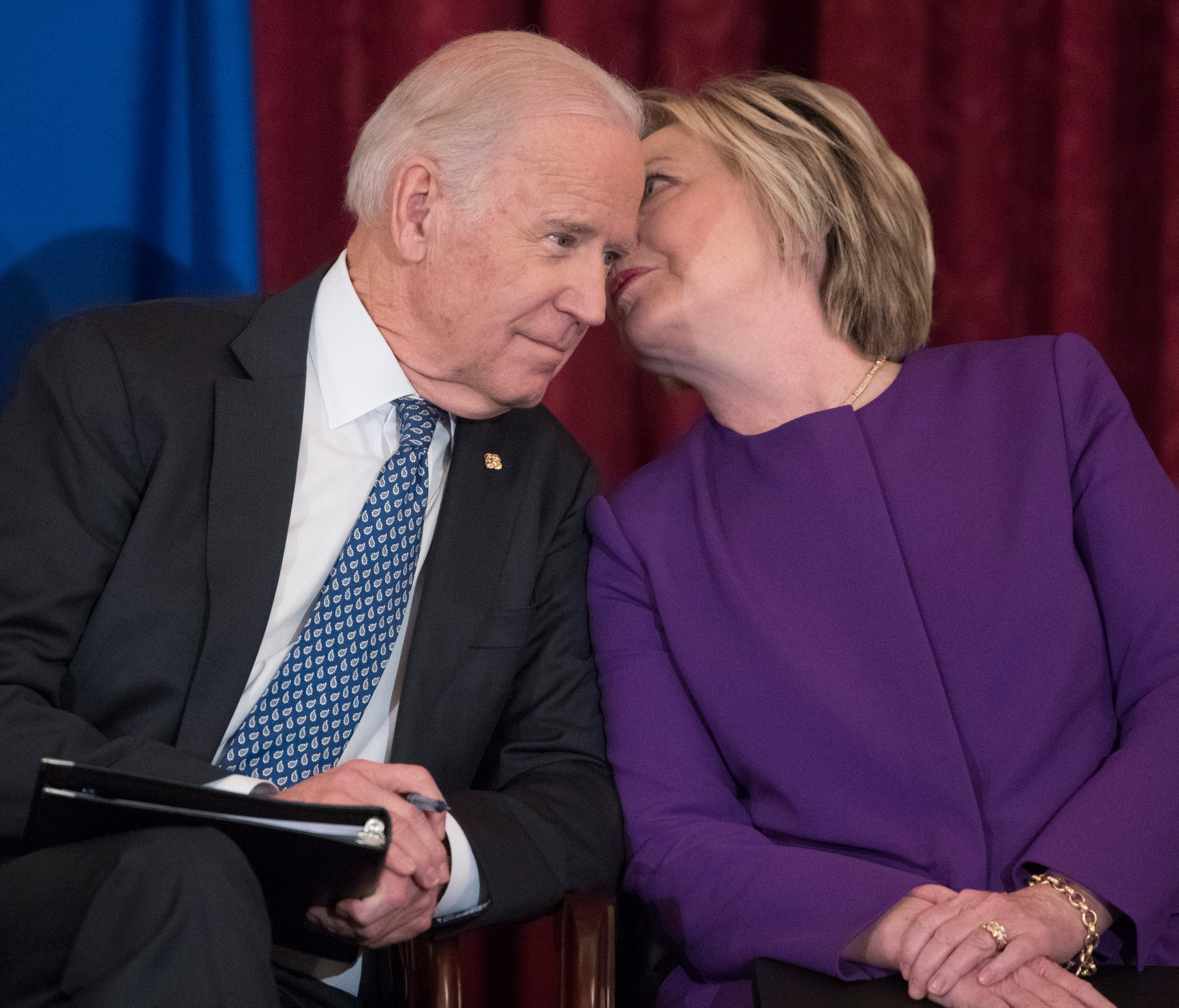 Hillary Clinton and Vice President Biden attend the unveiling of a portrait of Senate Democratic leader Harry Reid on Dec. 8, 2016.
