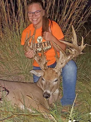 Fourteen-year-old Paslie Werth, of Cimarron, shot this 40-point whitetail buck unofficially measuring 282 6/8 inches while hunting with her father, Kurt, on family-owned property in Kiowa County.