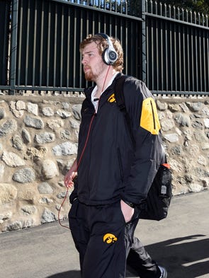 Iowa quarterback C.J. Beathard heads to the field as