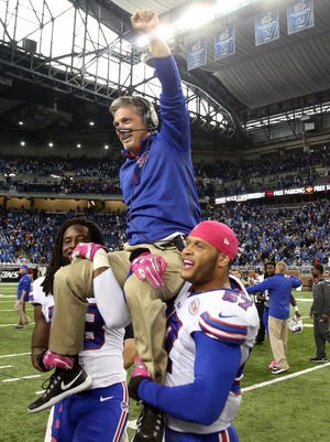 Former Detroit Lions head coach Jim Schwartz, now defensive coordinator for the Buffalo Bills, is carried off the field after the 17-14 win at Ford Field in Detroit Sunday, Oct. 5, 2014. (Kirthmon F. Dozier/Detroit Free Press/MCT)