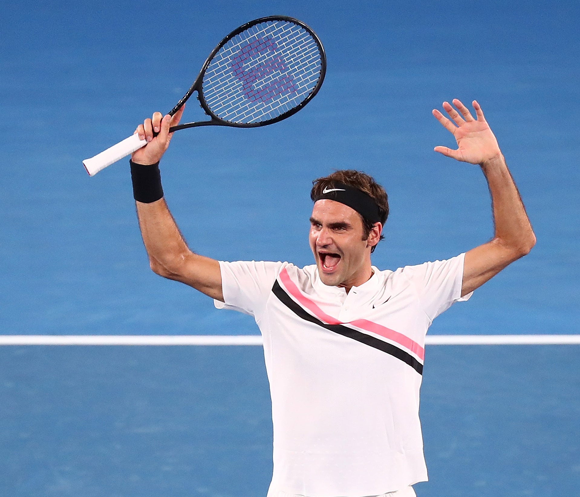 MELBOURNE, AUSTRALIA - JANUARY 28:  Roger Federer of Switzerland celebrates winning championship point in his men's singles final match against Marin Cilic of Croatia on day 14 of the 2018 Australian Open at Melbourne Park on January 28, 2018 in Melb