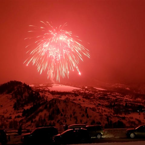 A firework explodes over Steamboat Springs, Colo.,