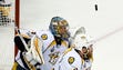 The puck sails above Nashville Predators goalie Pekka
