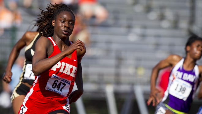 Pike High School sophomore Lynna Irby (647) competes in the 200 Meter Dash. The 42nd Annual Girl's Track and Field State Finals were held Saturday, June 6, 2015, at the Robert C. Haugh Track and Field Complex on the campus of Indiana University in Bloomington, Ind.