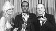 Robert Guillaume, center, accepts his Emmy Award  for