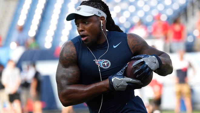 Titans running back Derrick Henry (22) warms up before the preseason game against the Tampa Bay Buccaneers at Nissan Stadium Saturday, Aug. 18, 2018, in Nashville, Tenn.