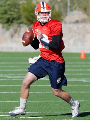 Junior quarterback Ryan Metz puts his team through drills during practice Tuesday morning as the Miners prepare for their next opponent, UTSA, in the Sun Bowl on Saturday night. Metz and UTEP’s second quarterback, senior Zack Greenlee, shared the snaps during practice since, as of now,no starter has been named for Saturday's game.