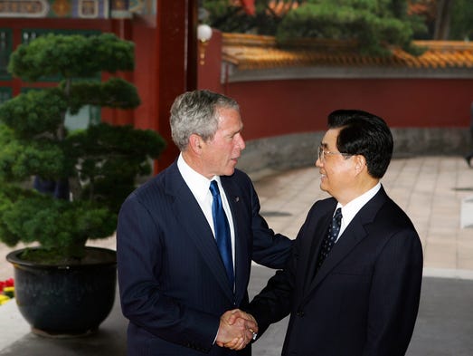 Chinese President Hu Jintao, right, greets U.S. President