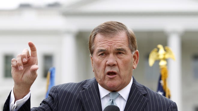 FILE - In this Oct. 22, 2011, file photo, former Secretary of Homeland Security Tom Ridge speaks to a crowd of hundreds protesting in front of the White House in Washington. Ridge also is the former governor of Pennsylvania. (AP Photo/Jose Luis Magana, File)