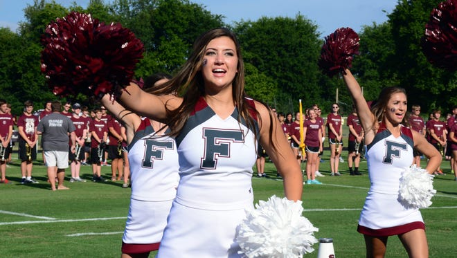 Franklin High School cheerleading captain Cate Chipman organized the school's first community pep rally.