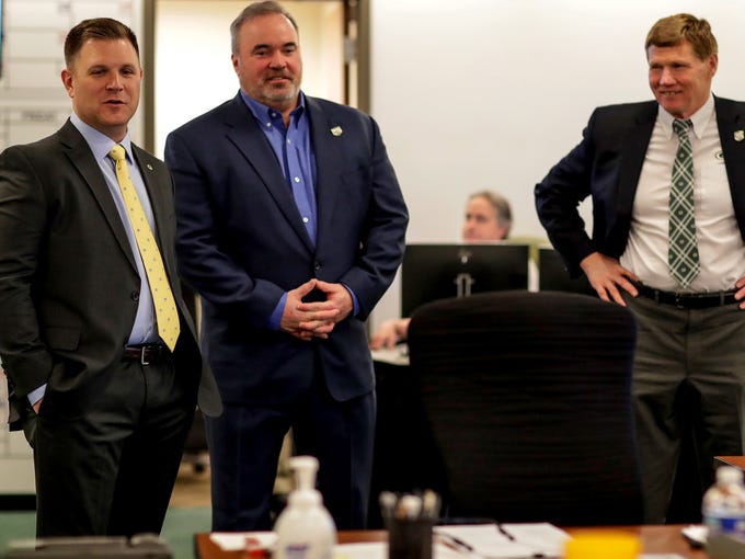 Green Bay Packers GM Brian Gutekunst (left), coach
