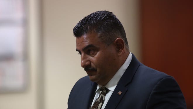 Coachella Valley Unified School Board member Frank Becerra appears in court to face perjury charges.