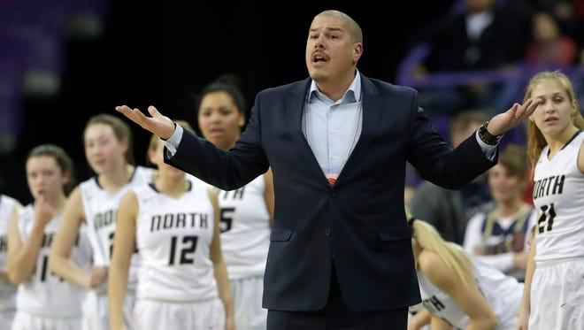 Joe Russom resigned as girls basketball coach Wednesday at Appleton North High School and has accepted a position in the Menasha school district.