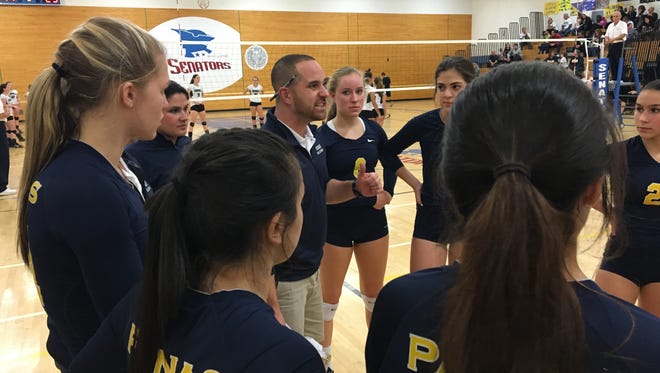 Panas volleyball head coach Joe Felipe talks to his team during a Class A state regional semifinal win over Cornwall at SUNY Ulster. Nov. 9, 2016.
