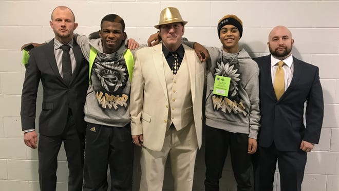 Warren Central's coach, Jim Tonte, bought his gold suit and hat ahead of Friday's state championship opener.
