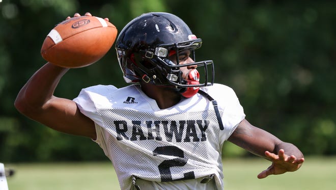 QB Zahir Wilder looks for an open receiver during Rahway High School football practice at Veteran's Memorial Stadium on August 25, 2016.