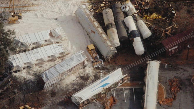 This aerial photograph shows the aftermath of a Norfolk Southern train crashing into an idle train in January 2005.

-Overturned rail cars remain strewn along the ground in Graniteville, S.C., in this aerial photo taken Friday afternoon, Jan., 7, 2005. At least eight people died and more than 250 were sickened after a freight train carrying toxic chlorine gas crashed early Thursday in one of the nation's deadliest chemical spills in years. (AP Photo/The Charlotte Observer, Todd Sumlin)