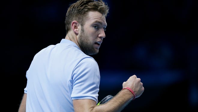 Jack Sock of the United States celebrates winning a point against Grigor Dimitrov of Bulgaria during their ATP World Tour Finals semifinal tennis match at the O2 Arena in London, Saturday Nov. 18, 2017. (AP Photo/Tim Ireland)